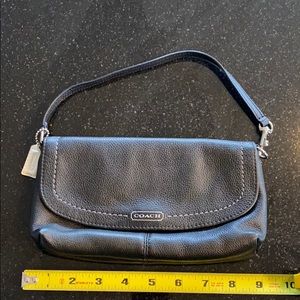 Black Leather Coach Clutch. Green satin lining.